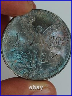 1985 1 OZ Mexican Libertad Coin. 999 Silver Onza TONING Coin 1985 1 OZ Mexican Libertad Coin. 999 Silver Onza TONING Coin