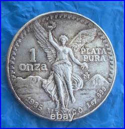 1985 Mo Mexico Libertad Onza 1 oz. 999 Silver -with slight rainbow toning