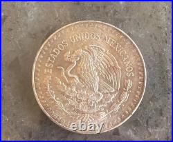 1985 Mo Mexico Libertad Onza 1 oz. 999 Silver -with slight rainbow toning