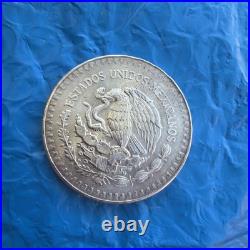 1985 Mo Mexico Libertad Onza 1 oz. 999 Silver -with slight rainbow toning