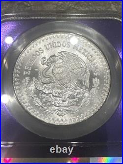 1986 Mo Mexico 1 Onza Silver Libertad NGC MS65 Purple Core 1986 Mo Mexico 1 Onza Silver Libertad NGC MS65 Purple Core
