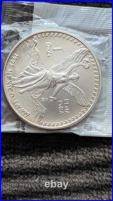 1993 Mexico Libertad 1 OZ Silver Coin. 999 ONZA Littleton Plastic Holder