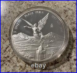 1997 Mexico 5 oz Silver Libertad BU, Toned mirror finish. 999 pure silver 1997 Mexico 5 oz Silver Libertad BU, Toned mirror finish. 999 pure silver