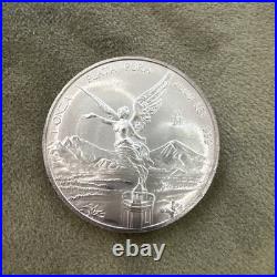 2000 Mexico Onza / Libertad 1 oz. 999 Silver Purple Toning Starting