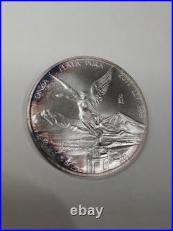 2011 Mexican Libertad 1 oz Silver Uncirculated Coin Natural Rainbow Edge Toning