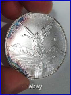2011 Mexican Libertad 1 oz Silver Uncirculated Coin Natural Rainbow Edge Toning