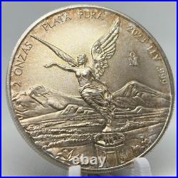 2023 2 oz Naturally TONED Libertad BU in Mint Capsule 2023 2 oz Naturally TONED Libertad BU in Mint Capsule