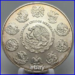 2023 2 oz Naturally TONED Libertad BU in Mint Capsule 2023 2 oz Naturally TONED Libertad BU in Mint Capsule