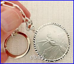 Diamond Bezel Keychain (S925) New Year 2023 BU 1 Oz. Libertad