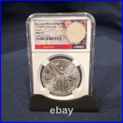 Mexico 1984 Mo, 1 Onza Silver. NGC Certified MS 65 / 1 Troy Oz. 999 With Bag Frag