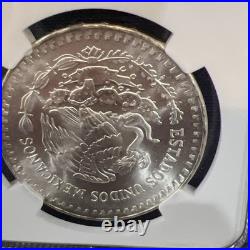Mexico 1984 Mo, 1 Onza Silver. NGC Certified MS 65 / 1 Troy Oz. 999 With Bag Frag